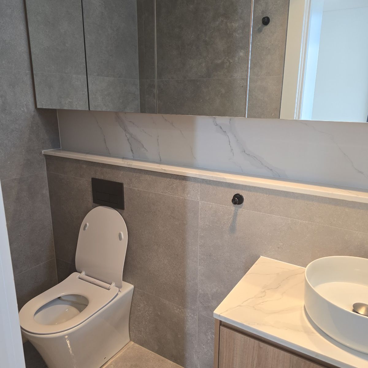 Clean vanity and toilet after a bond clean